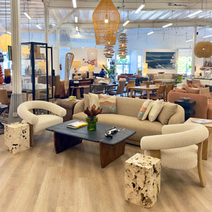 Sofa (39030-caml), Coffee table (16517-blck), Occasional Chairs (39008-crem), End Table (22070-natl)